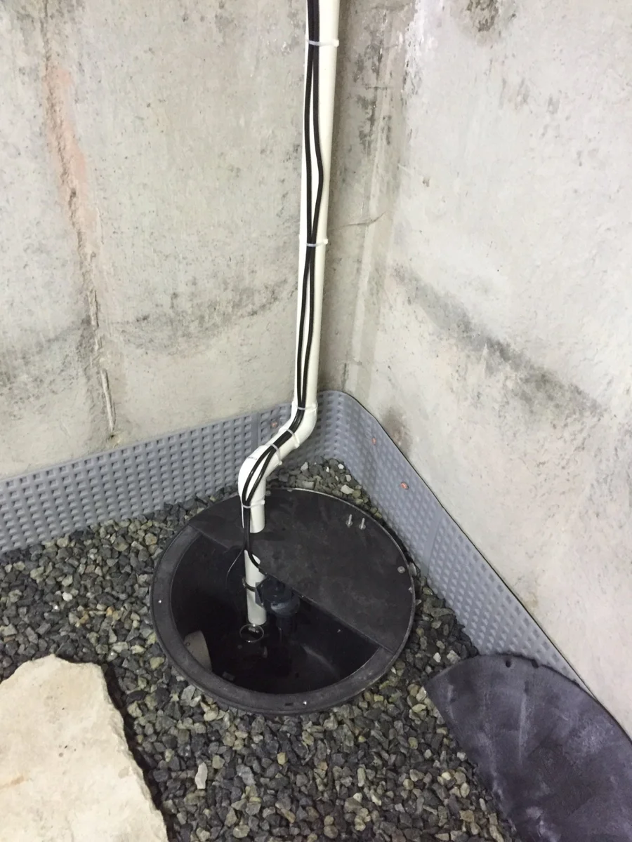 SafeStep sump-pump pit and discharge installation